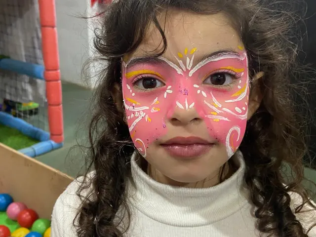 Mariposa rosa con brillos